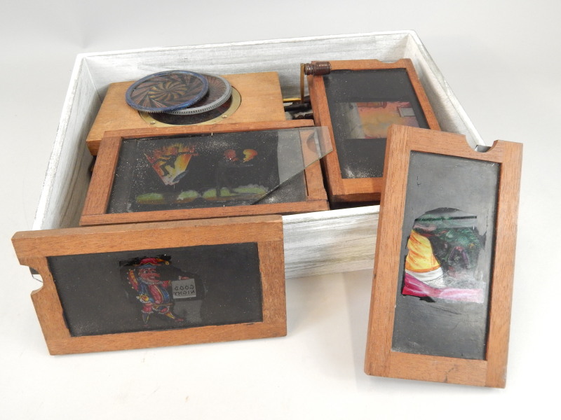 Appraisal: Various Victorian magic lantern slides to include some automaton type