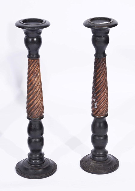 Appraisal: A PAIR OF DUTCH EBONISED AND SPIRAL TURNED WOOD CANDLE