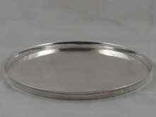 Appraisal: A plain silver circular tray cm dia German assay Wt