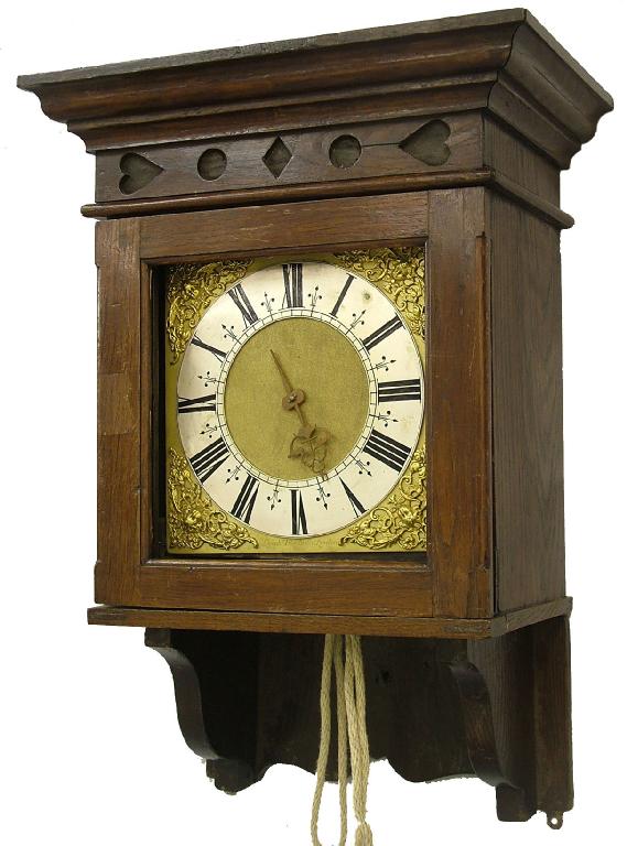 Appraisal: Good and interesting hooded wall clock movement the square brass