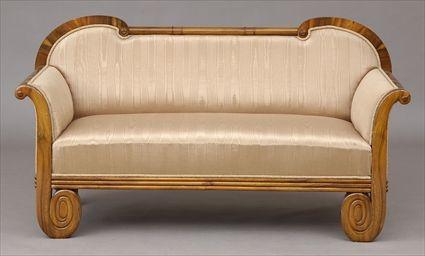 Appraisal: BIEDERMEIER WALNUT SETTEE The top rail with c-scrolls joined by