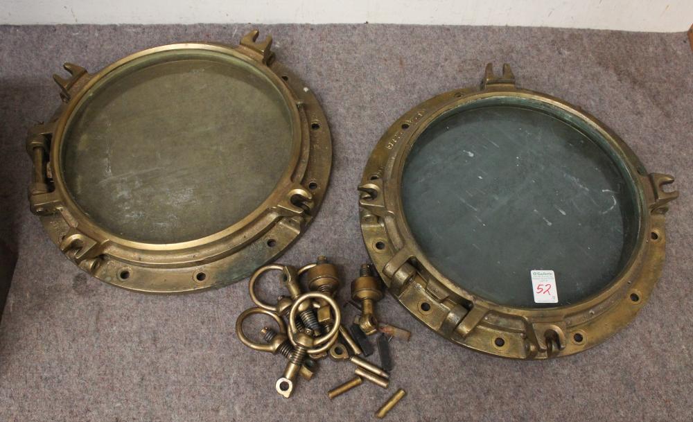 Appraisal: A PAIR OF BRASS MARITIME PORTHOLES circular ship's hull windows