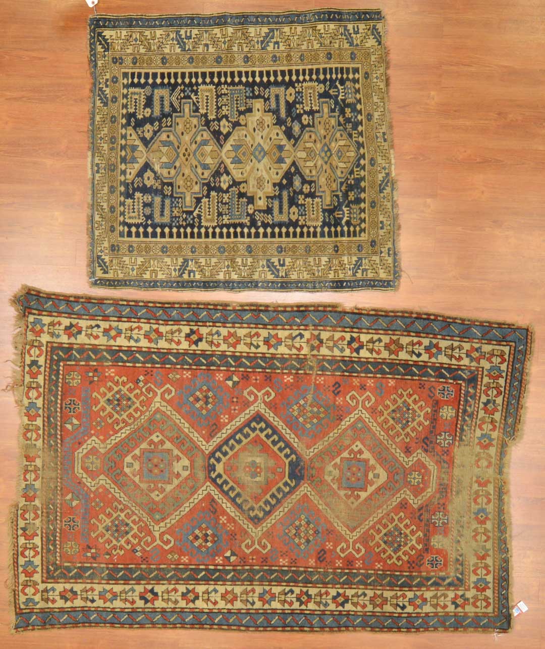 Appraisal: Two antique Caucasian rugs Caucasus circa Sizes are approximately x