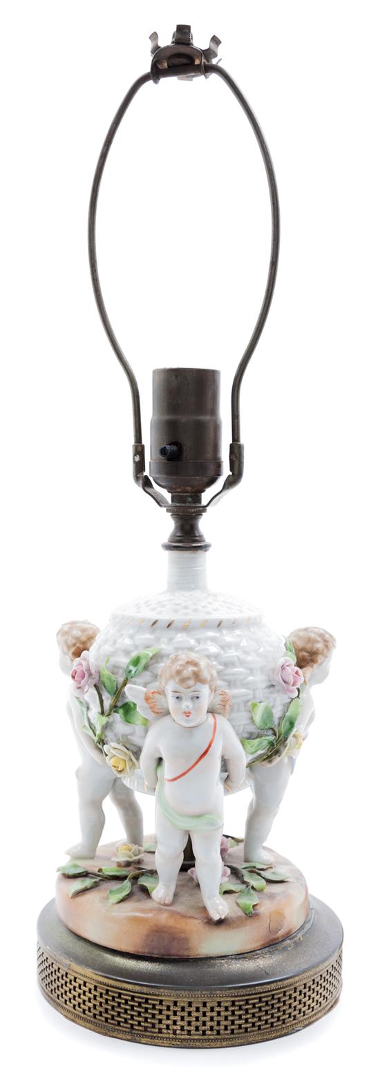 Appraisal: Sale Lot A Figural Table Lamp decorated with three putti