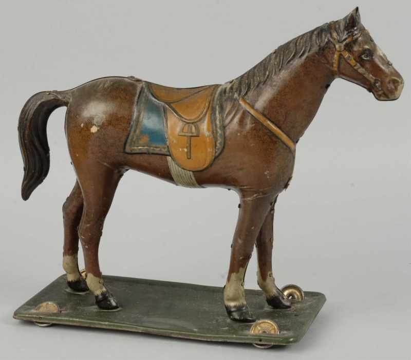 Appraisal: Tin Horse on Platform Pull Toy Description With metal wheels