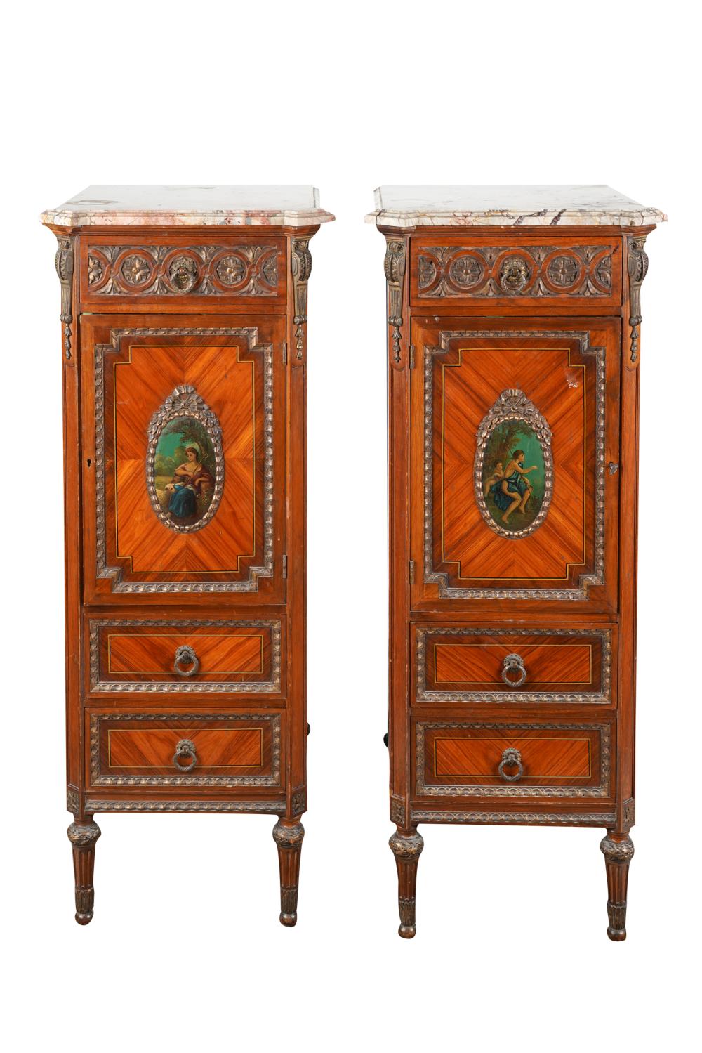 Appraisal: PAIR OF NARROW FRENCH MARBLE TOP CABINETSwith three pull out