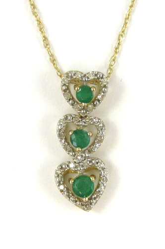 Appraisal: EMERALD AND FOURTEEN KARAT GOLD PENDANT NECKLACE the pendant suspended