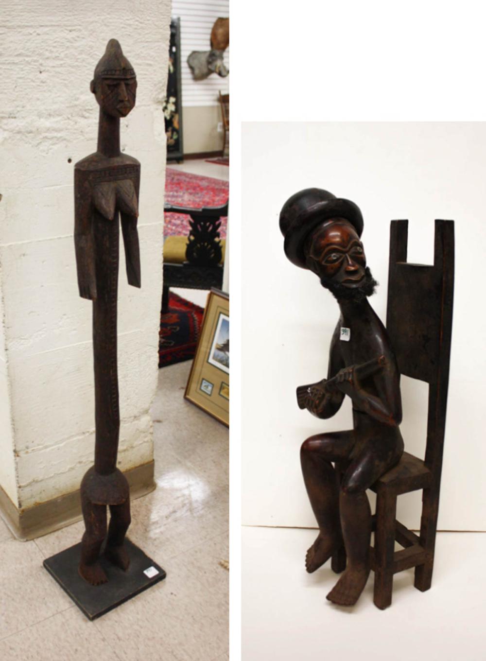 Appraisal: TWO AFRICAN CARVED WOOD TRIBAL FIGURES nude male figure seated