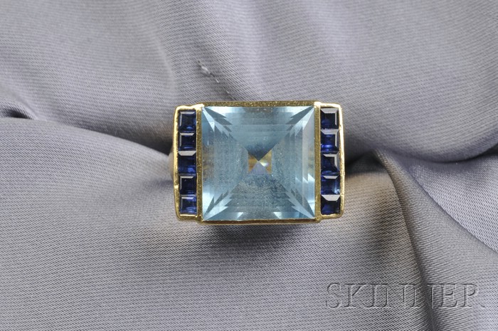 Appraisal: kt Gold Blue Topaz and Sapphire Ring bezel-set with a