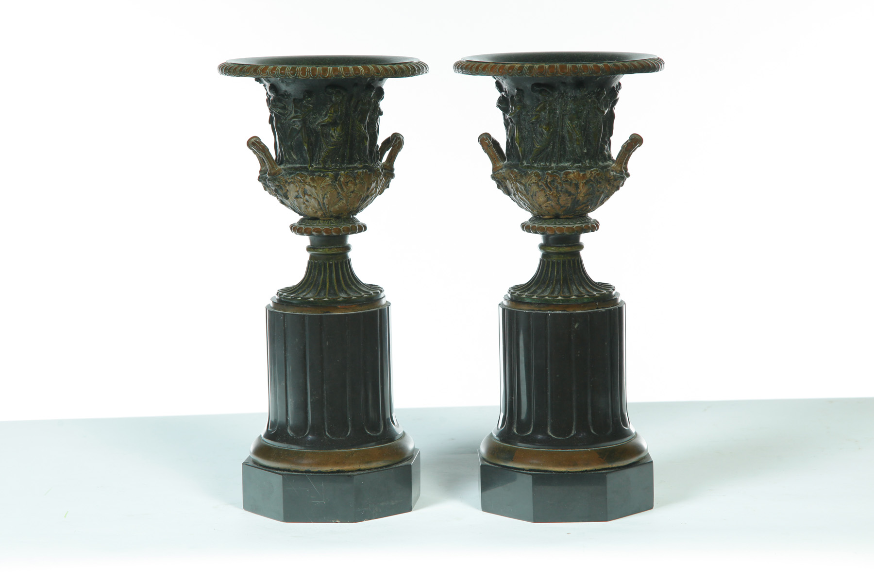 Appraisal: PAIR OF CAST BRONZE URNS ON SLATE PLINTHS European st