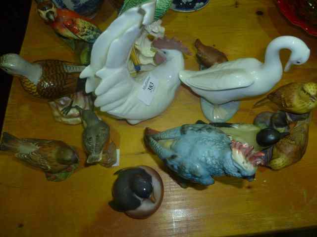 Appraisal: A COLLECTION OF TWELVE LLADRO COPENHAGEN WORCESTER and other birds