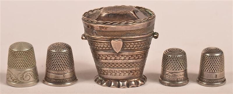 Appraisal: Silver Thimble Case and Four Various Thimbles th Century Silver