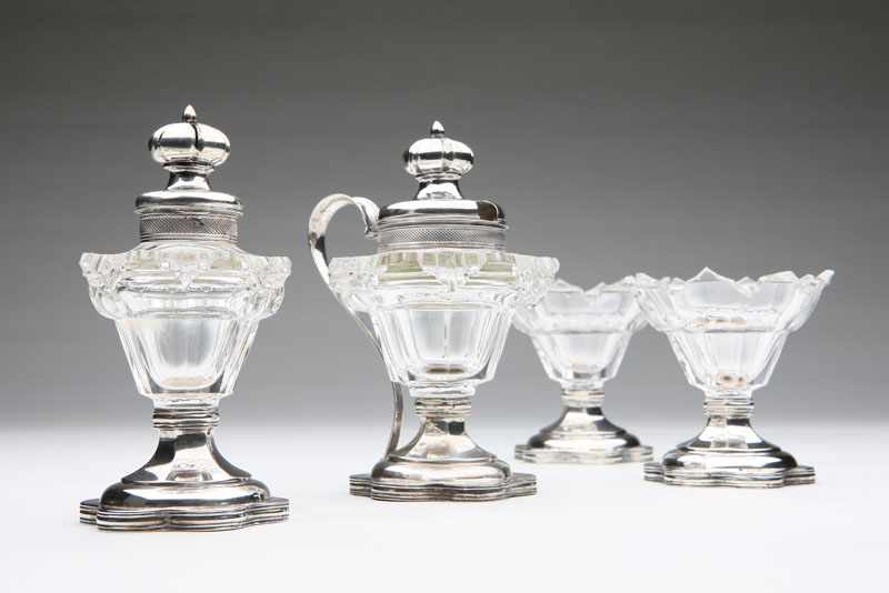 Appraisal: A Dutch silver-mounted cut-glass four-piece condiment set Johan Casper Rennefeld