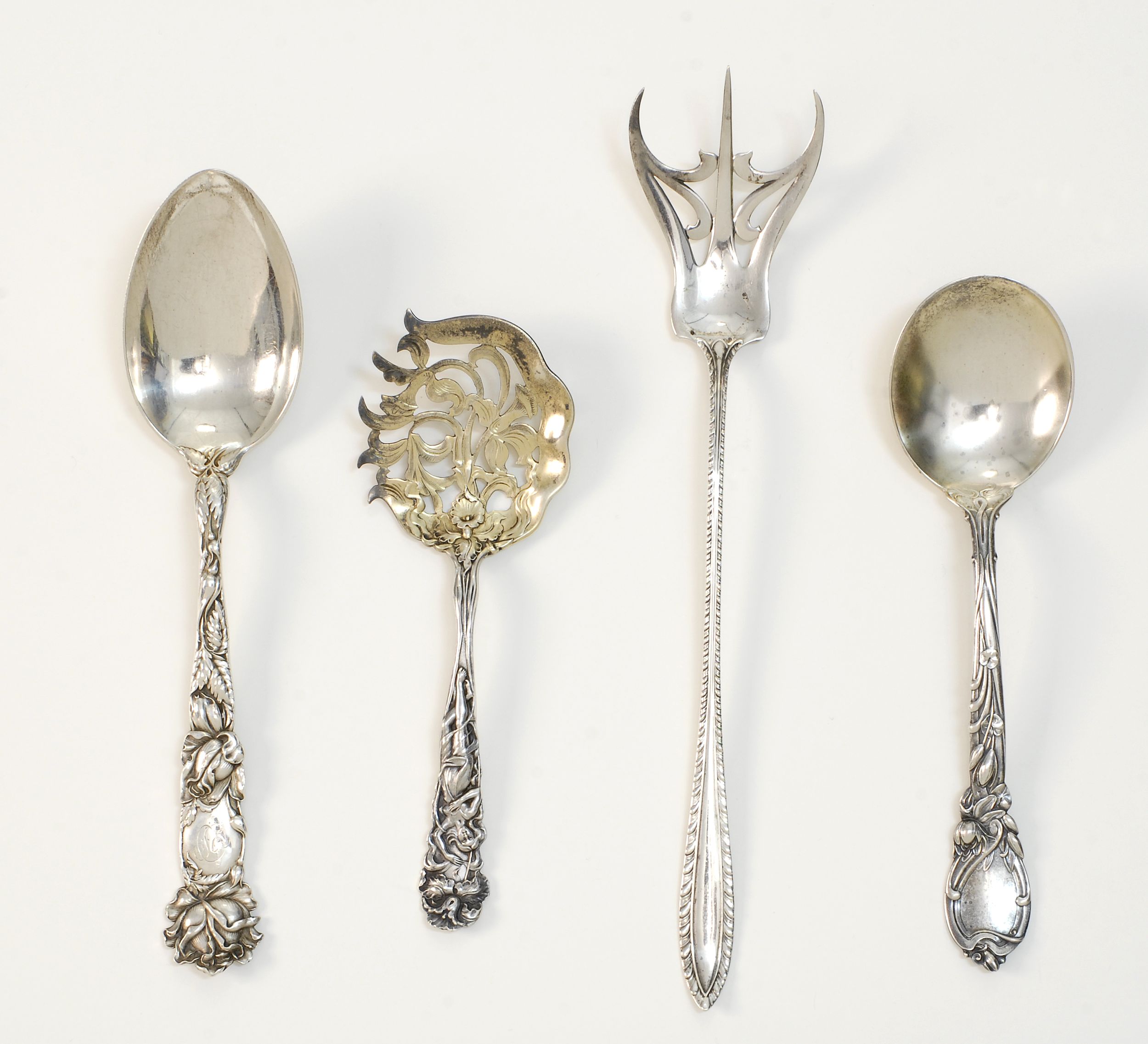 Appraisal: FOUR STERLING SILVER SERVING ITEMS A cucumber server by Alvin