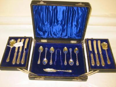 Appraisal: AN AFTERNOON TEA SET for six settings including teaspoons tongs