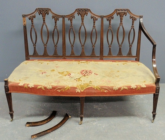 Appraisal: - Georgian mahogany settee c with a carved back and