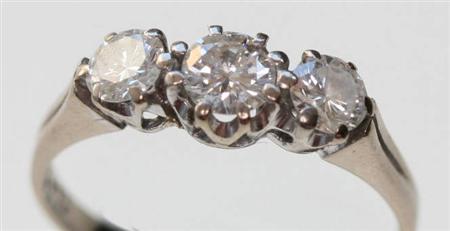 Appraisal: A three stone diamond ring the three graduated circular cut