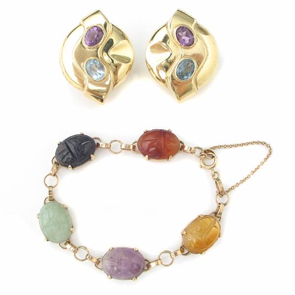 Appraisal: A scarab gem-set bracelet with a pair of gem-set and