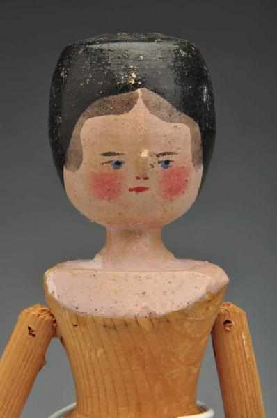 Appraisal: Late s Jointed Wooden Doll Description All wooden doll with