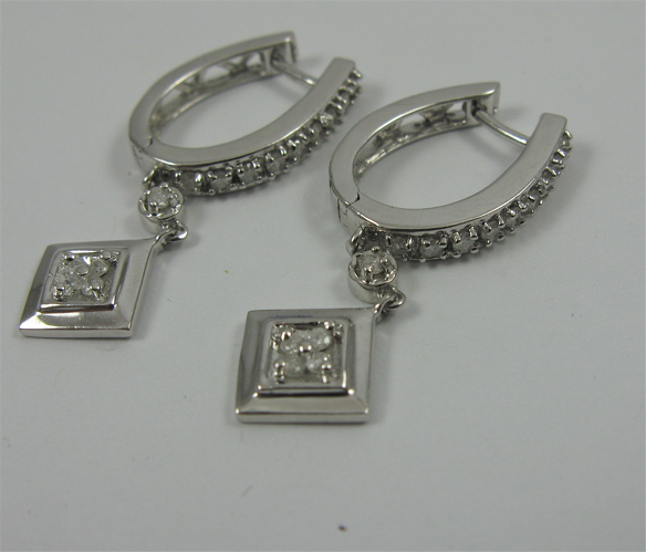 Appraisal: PAIR OF DIAMOND AND K WHITE GOLD EARRINGS each set