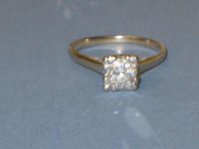 Appraisal: A SOLITAIRE DIAMOND RING the brilliant cut stone cts within