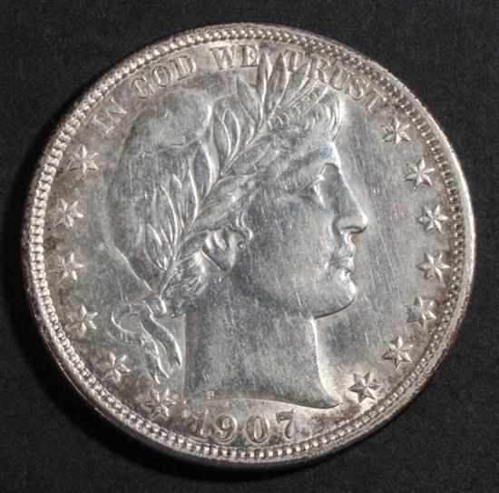 Appraisal: Two United States Barber type silver half dollars EF- and