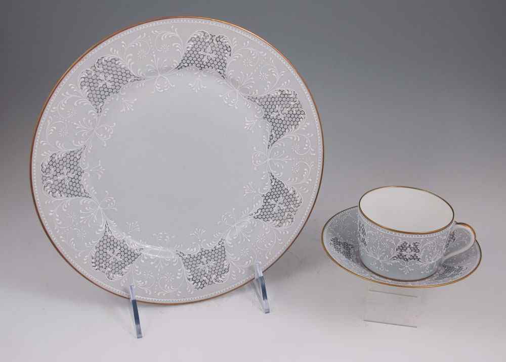 Appraisal: FINE FRENCH CHINA PARTIAL SERVICE Heavy white enamel decoration in