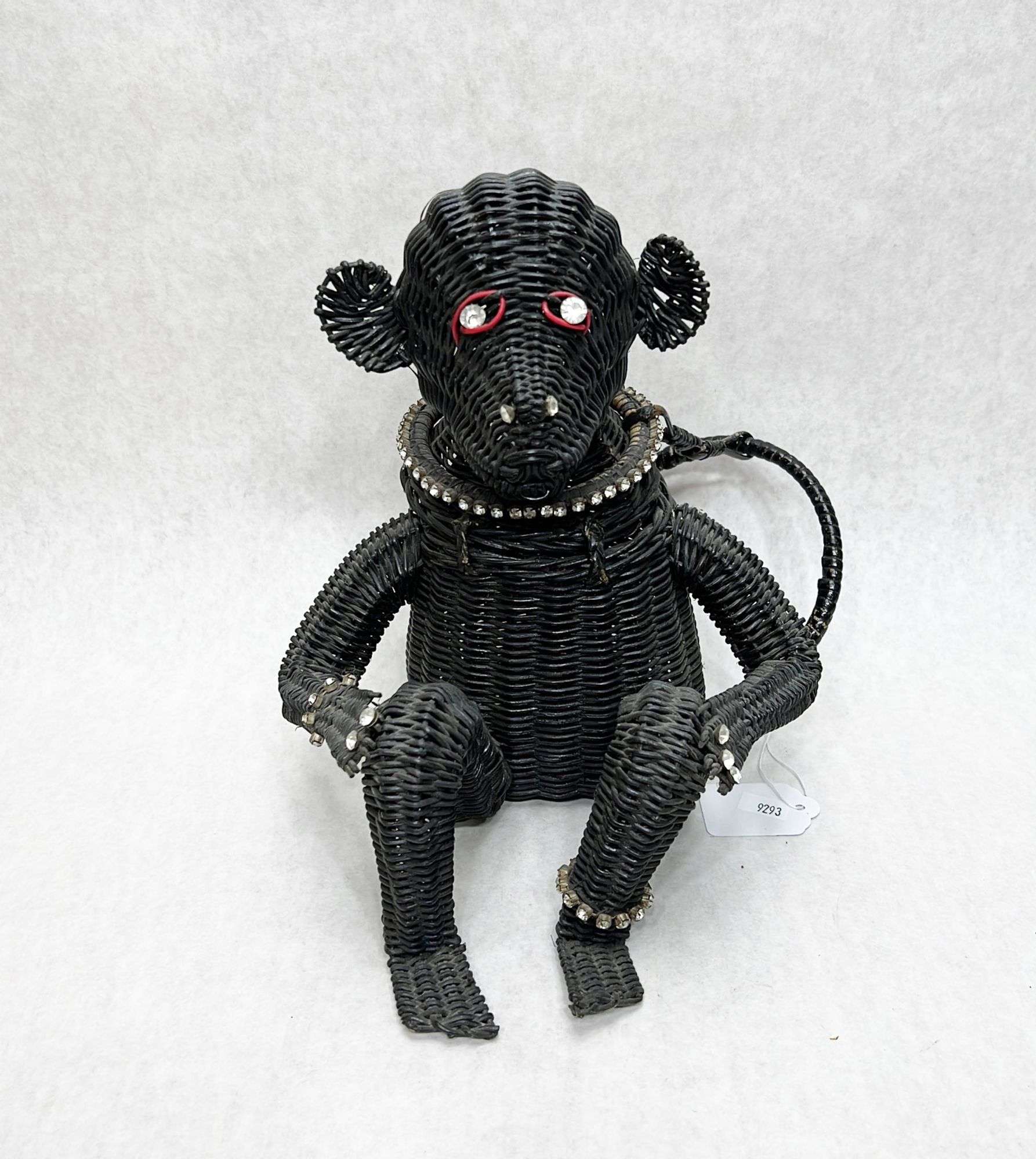 Appraisal: Figural Wicker Monkey Purse tall Condition Good no noticeable damage