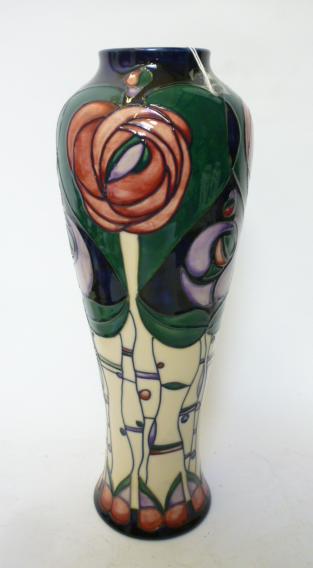 Appraisal: A MOORCROFT POTTERY TALL VASE modern of slender inverted baluster