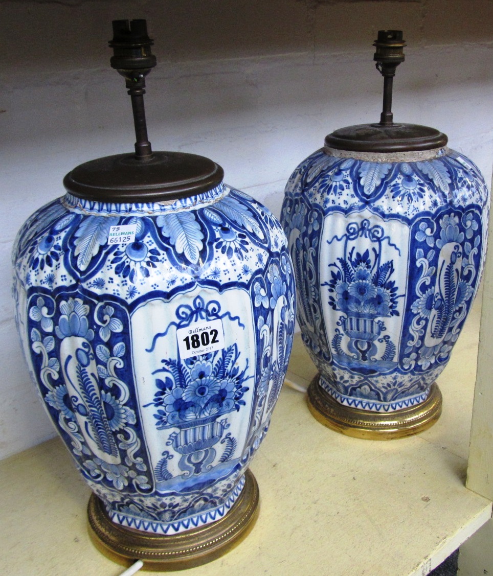 Appraisal: A pair of tinglaze Delft Ware table lamps formerly vases