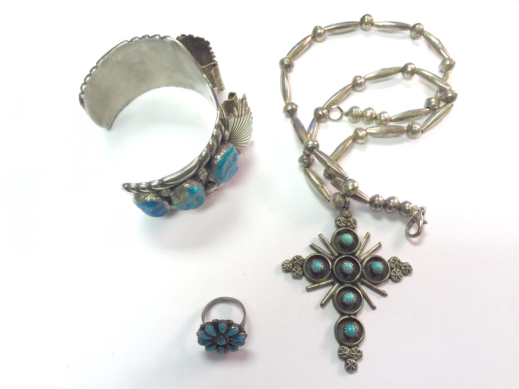 Appraisal: THREE PIECES OF AMERICAN INDIAN SILVER AND TURQUOISE JEWELRY Cross