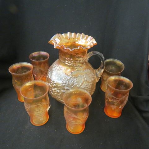 Appraisal: Carnival Glass Grape Cable Pitcher marigold with six similar tumblers