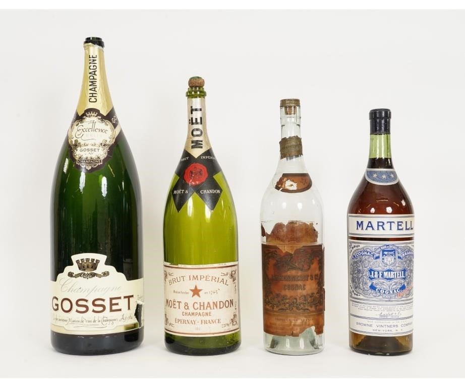 Appraisal: Four vintage bar top liquor bottles the largest Gosset Champagne