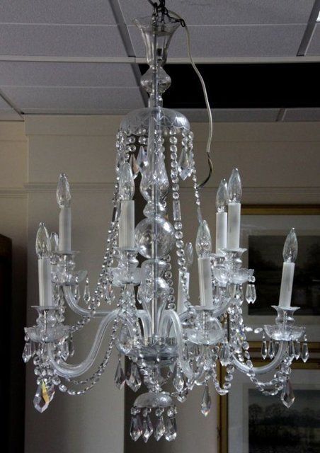 Appraisal: A large th Century cut glass chandelier with ten scrolling