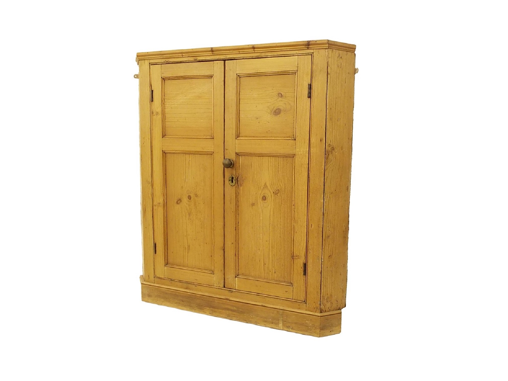 Appraisal: Antique pine corner cupboard panelled doors enclosing a shelved interior