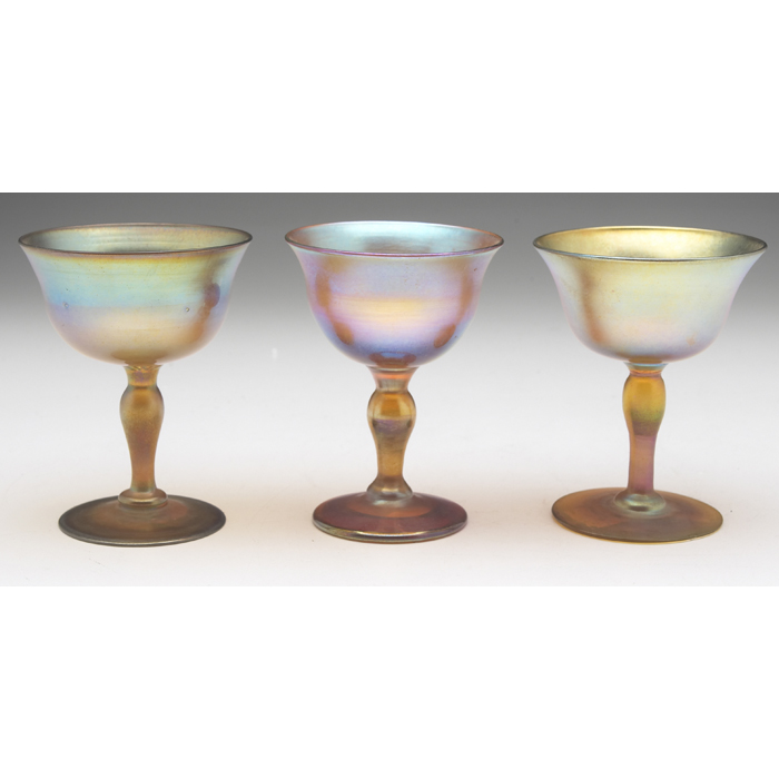 Appraisal: L C Tiffany glasses three in gold favrile glass overall