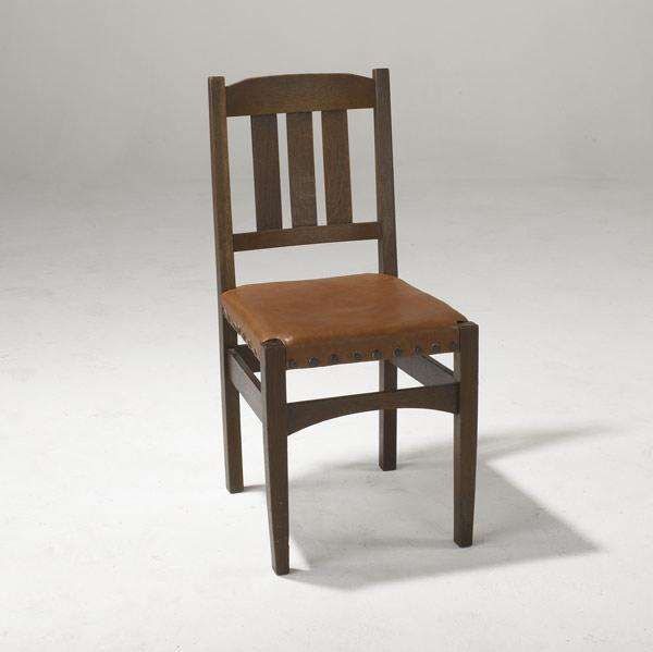 Appraisal: GUSTAV STICKLEY Side chair with arched crest rail and stretchers