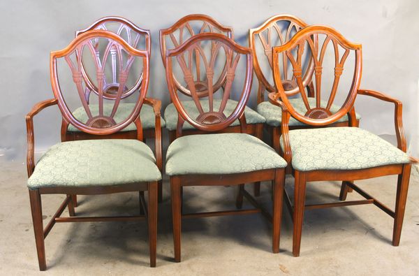 Appraisal: Set of six circa s s mahogany shield-back chairs arm