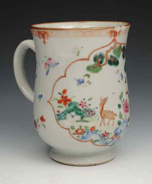 Appraisal: AN TH CENTURY CHINESE BALUSTER TANKARD with scrolling handle decorated