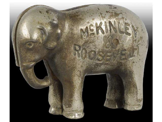 Appraisal: Cast Iron Roosevelt McKinley Elephant Still Bank Description Made in