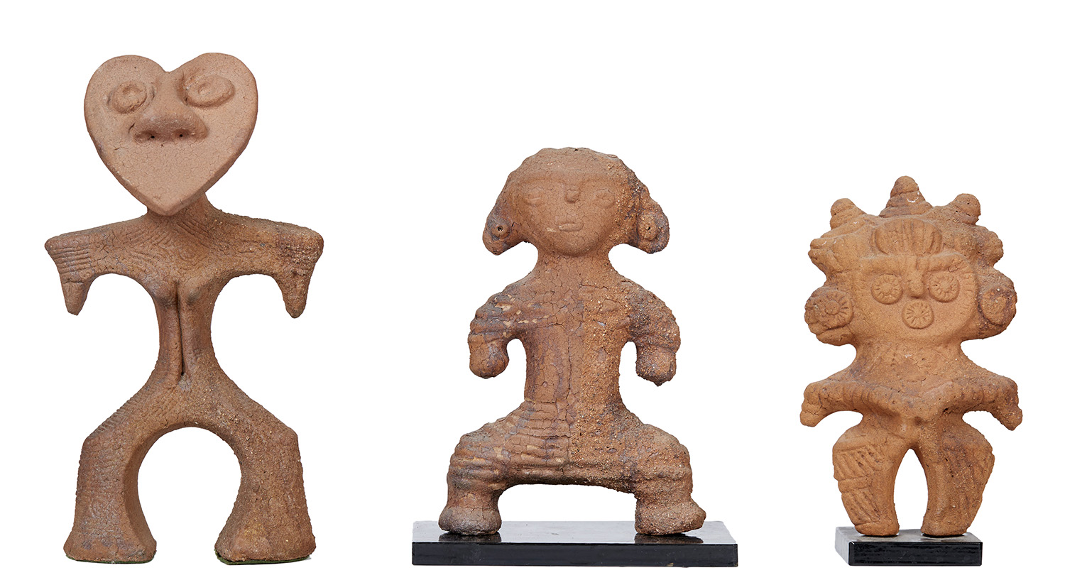 Appraisal: THREE PERUVIAN AND SOUTH AMERICAN TERRACOTTA FIGURES Each depicting abstract