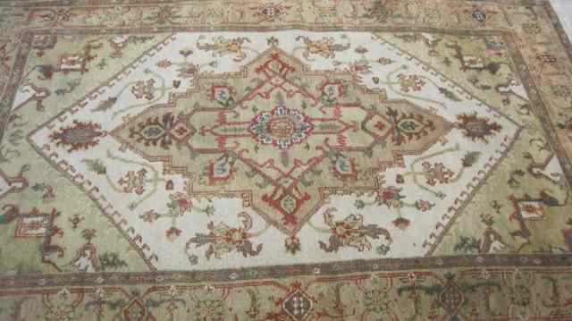 Appraisal: HAND KNOTTED ORIENTAL CARPET Indo-Persian Serapi design of Northwest Persian