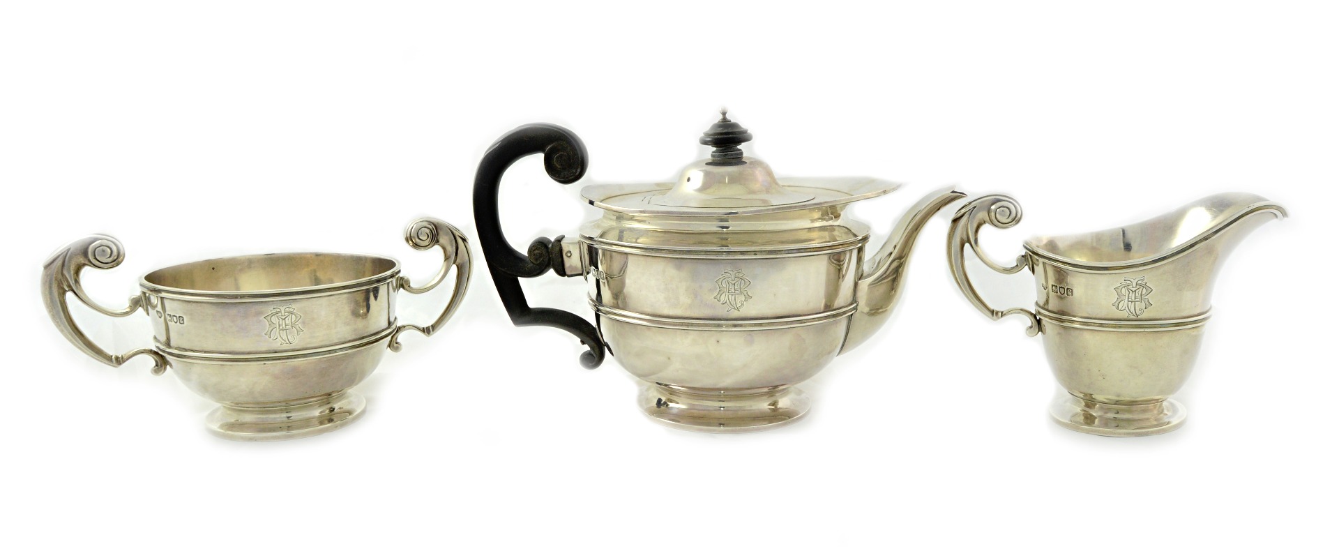 Appraisal: An Edwardian silver three piece tea service Goldsmiths Silversmiths Company