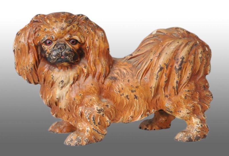 Appraisal: Cast Iron Pekingese Dog Doorstop Description Made by Hubley cat