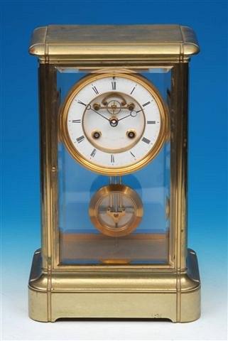 Appraisal: A FRENCH FOUR GLASS MANTEL CLOCK with enamel dial exposed