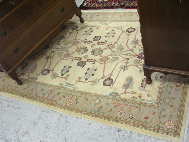 Appraisal: AN AFGHANI PERSIAN AREA RUG having a cream field with