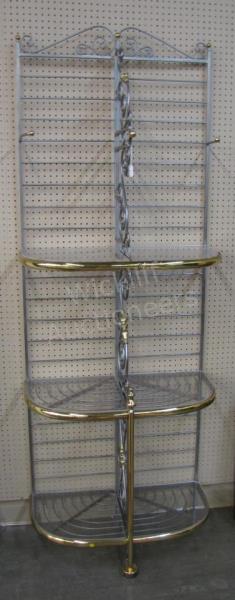 Appraisal: A cast metal and brass baker's rack with plexi-glass shelves