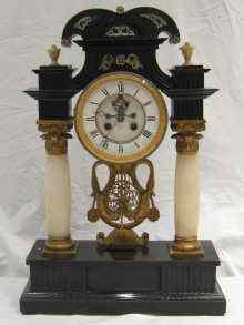 Appraisal: A th century French striking mantel clock with exposed escapement