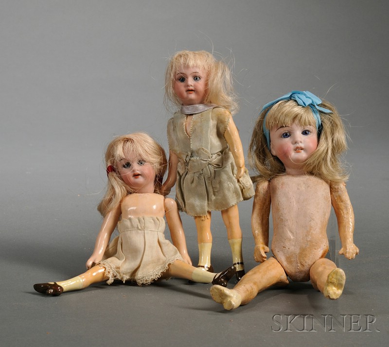 Appraisal: Three Small Bisque Dolls Heubach with open mouth fixed blue