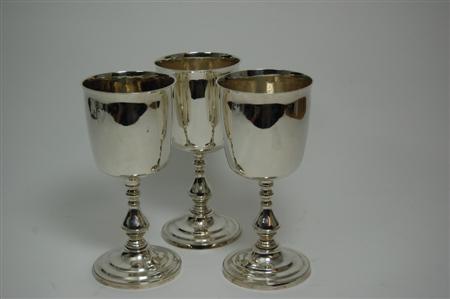 Appraisal: A set of three George III communion cups by IG